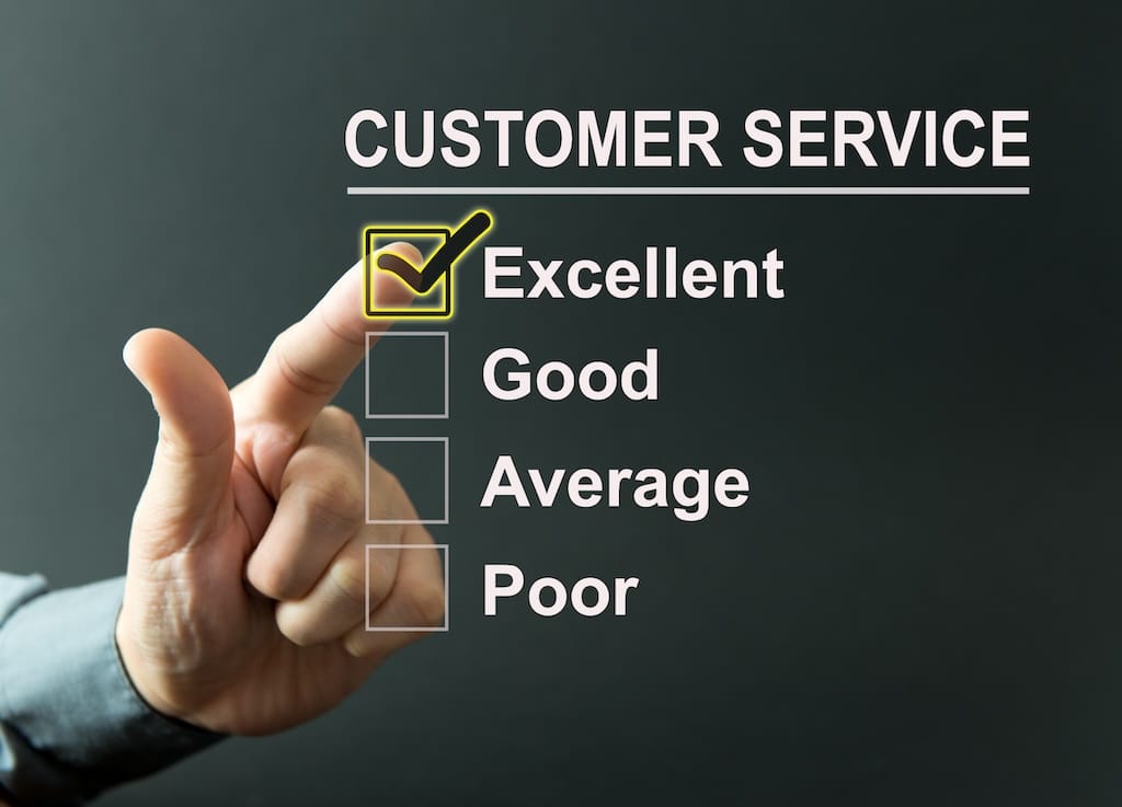 Hand selecting excellent customer service checkbox